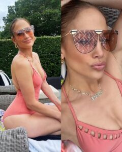 She is a peach! Jennifer Lopez, wears a low-cut swimsuit as she shows off her famous butt…There’s something that attracts me more